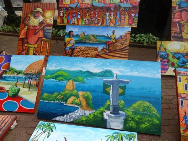 Paintings being sold at an outdoor market in Campinas, Brazil