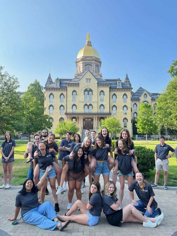 Ellie Villaruz and all of the other RC's take a group picture before Summer Scholars come the next day in their signature polos!