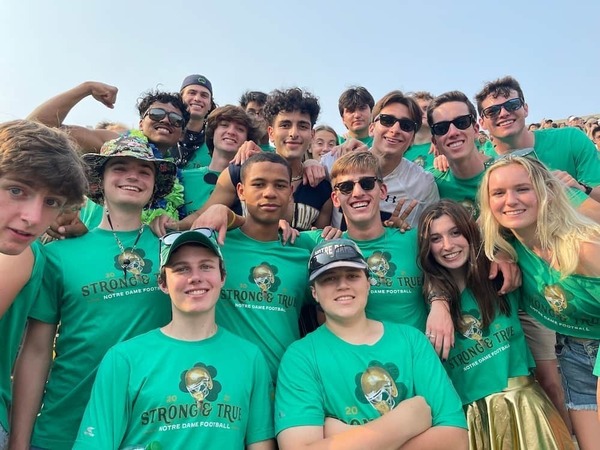 Mark Metryoos with a group of friends at a Notre Dame home football game at Notre Dame Stadium.