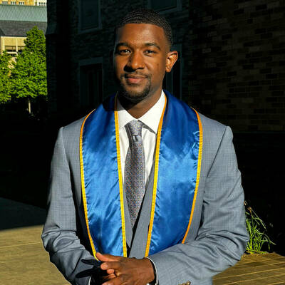 Trey Lane '24 wearing his graduation sash