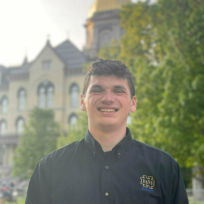 David Finnell '24 in front of the Golden Dome