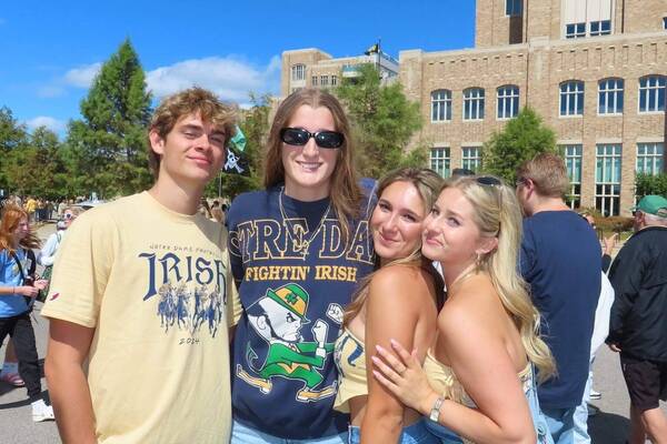 Sly Marona ‘27 and friends at the first home game of the season. Students and fans typically wear The Shirt on the first home game which is what he is wearing.