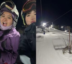 Saya and her friend Hayley on the ski lift while volunteering with SOLO.